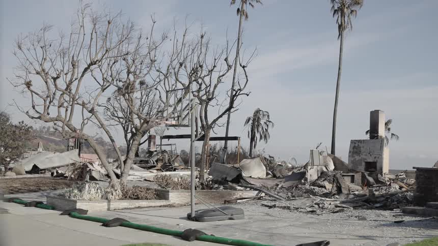 A residential building is completely leveled following a storm