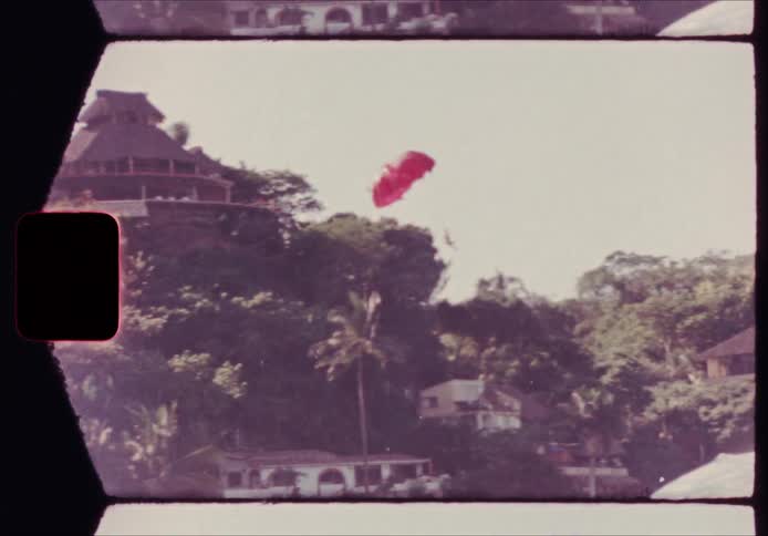 Action figure parachute flying in the wind