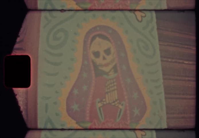 Two colorful pieces of artwork contain a skull as an element