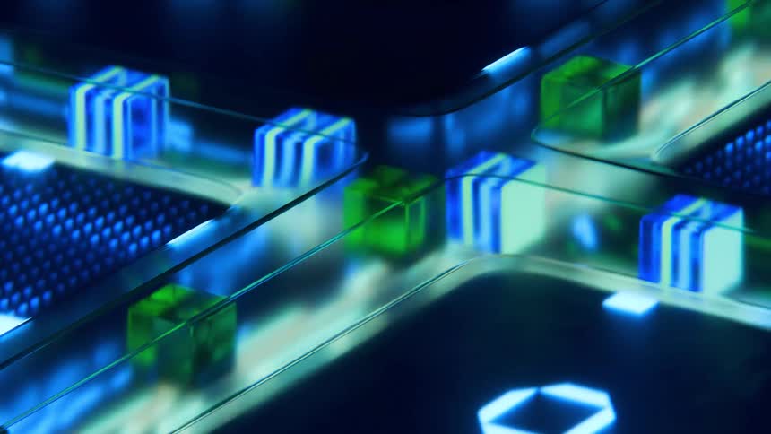 Green cubes and white and blue striped cubes pass through an intersection between pattern forming sections