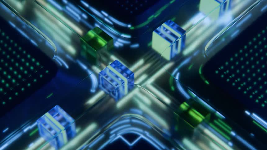 Small translucent blue and green cubes move along glowing light paths on a dark electronic circuit board with a futuristic high tech feel