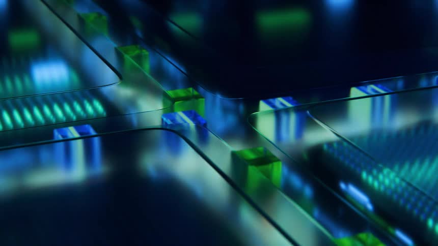 A futuristic blue circuit board where glowing green data blocks move along illuminated pathways between glass panels and microchips
