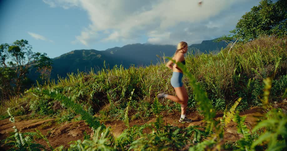 A woman running up a hill