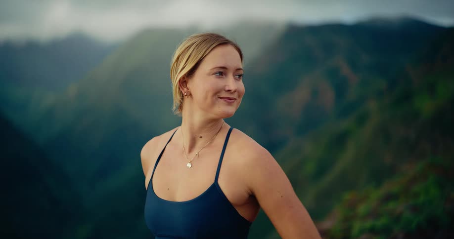 A woman running on a trail outdoors