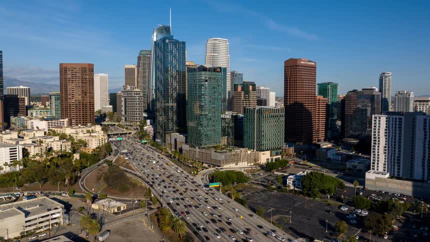 Heavy traffic flows through the freeway in Downtown Los Angeles