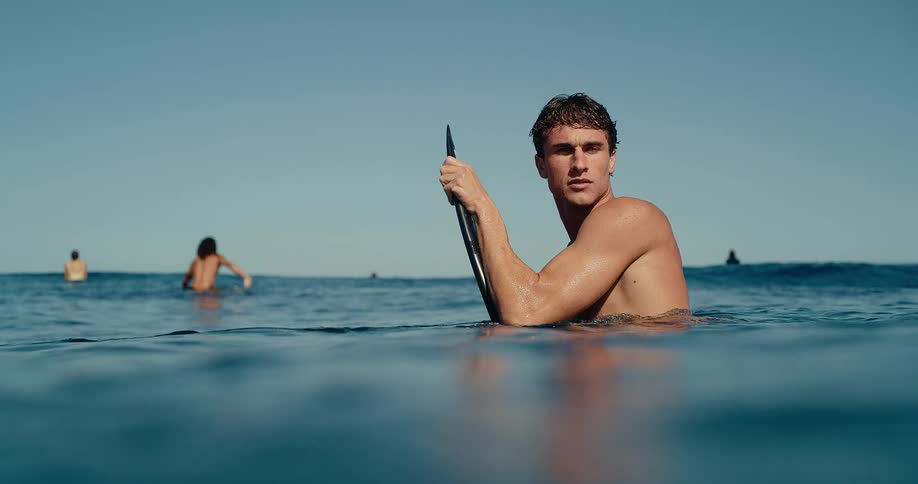 Surfers in the ocean waiting for waves
