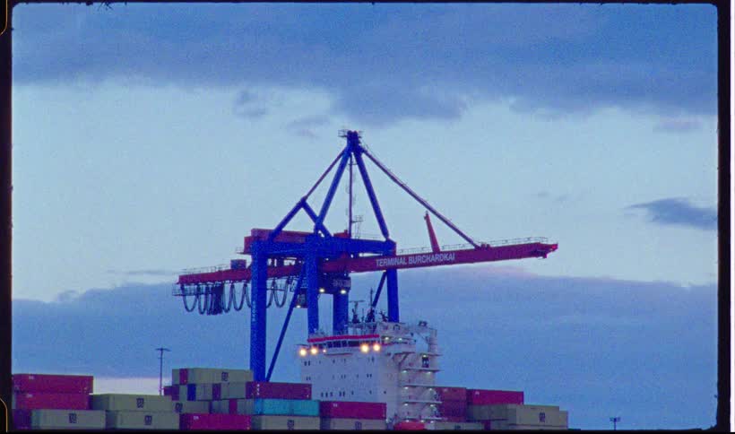 Container crane on the shipping port along the coast