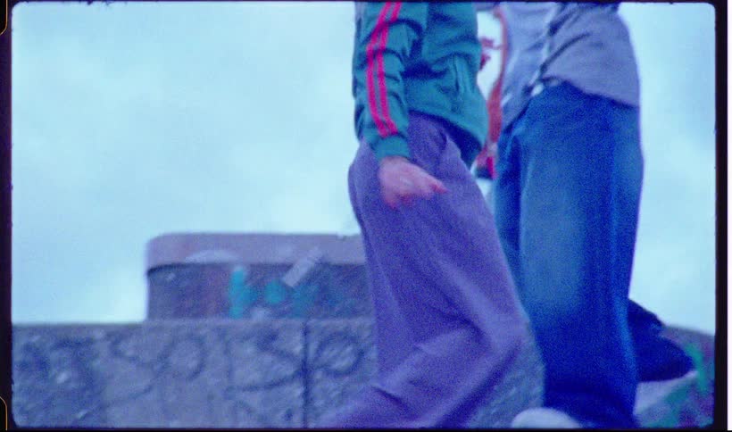 Young people walking on outdoor stairs in casual clothes