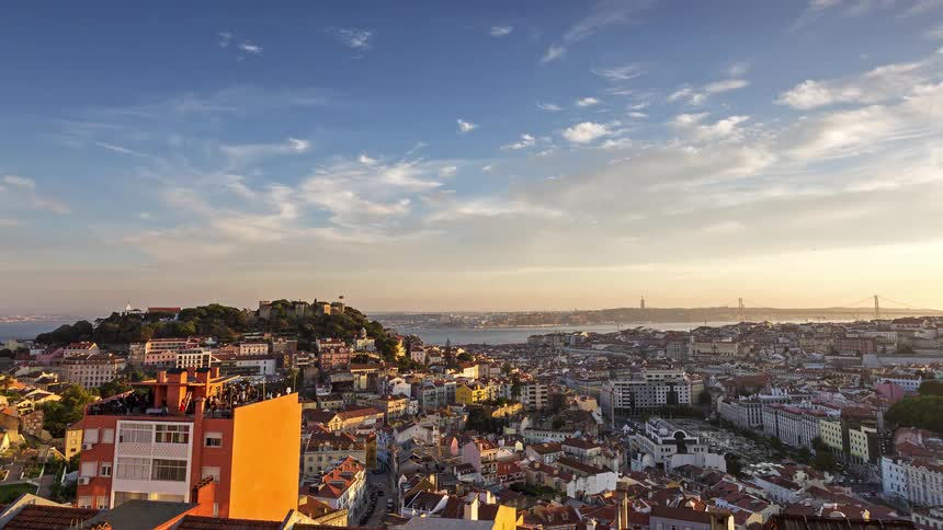 A time lapse of a sunset over a city