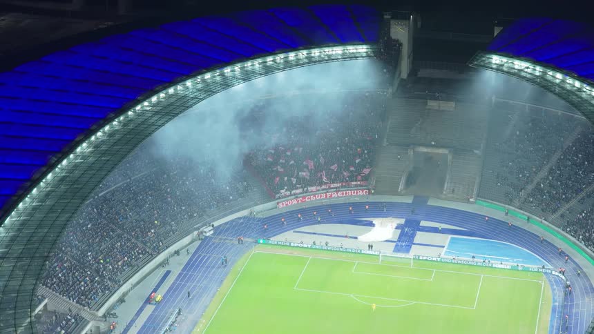 Aerial of fans sitting in a soccer stadium