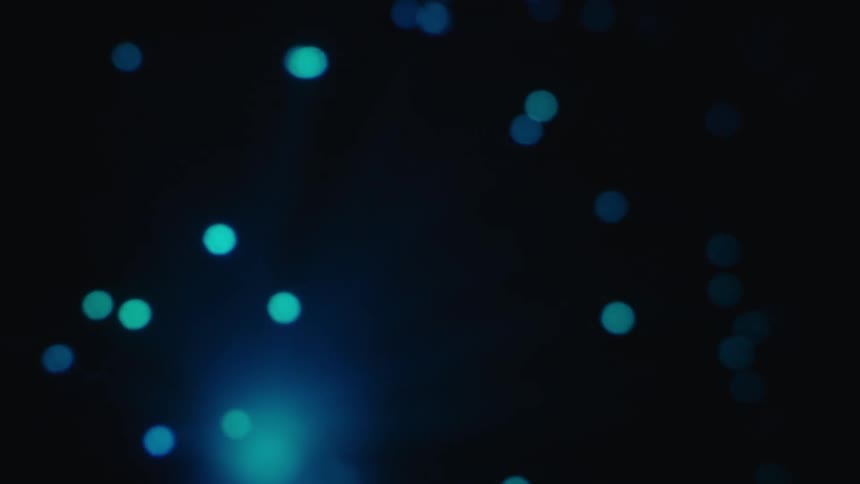 Outoffocus light dots scattered across a dark background