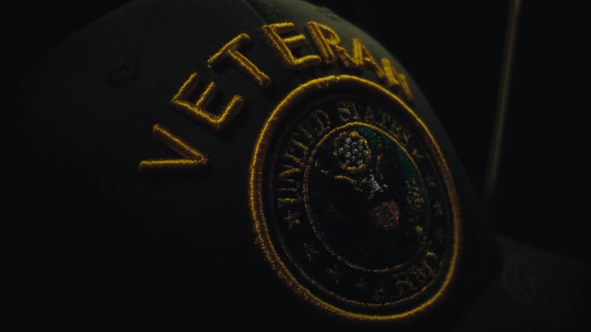 Hat with a united states veteran patch on the front