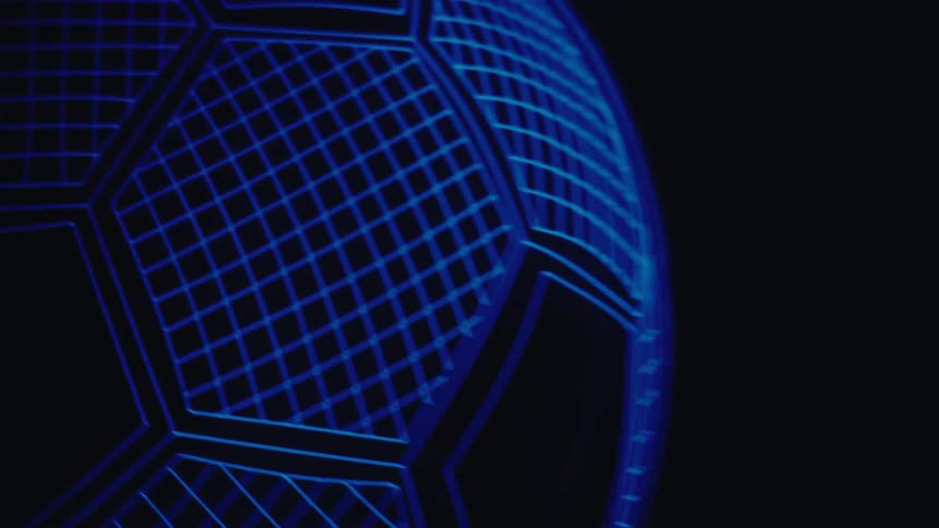A digital soccer ball that is blue and black