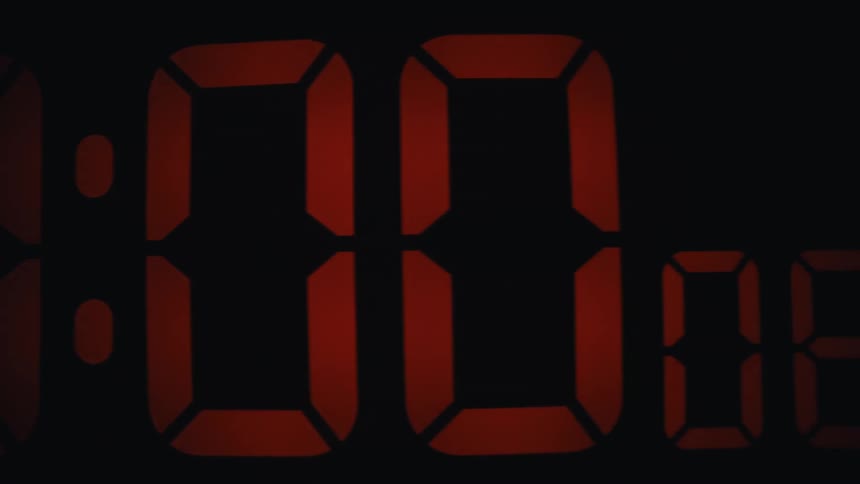 Red digital numbers displayed on an electronic watch face