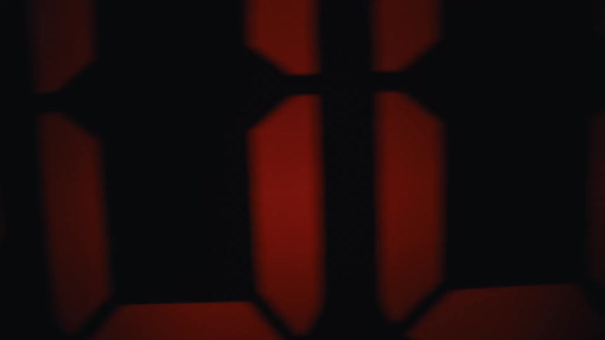 A close up of a clock with numbers on it