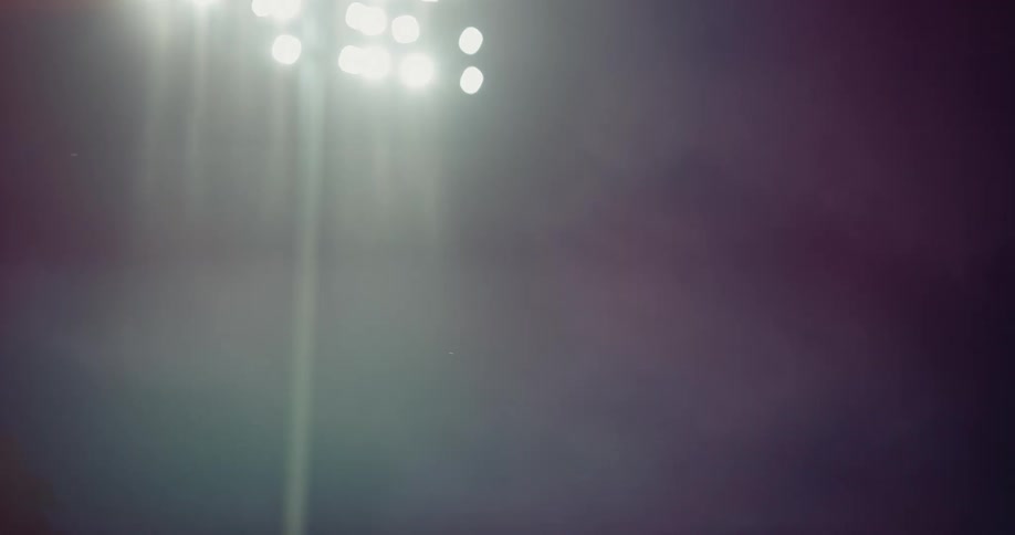 A view of large lights at a stadium