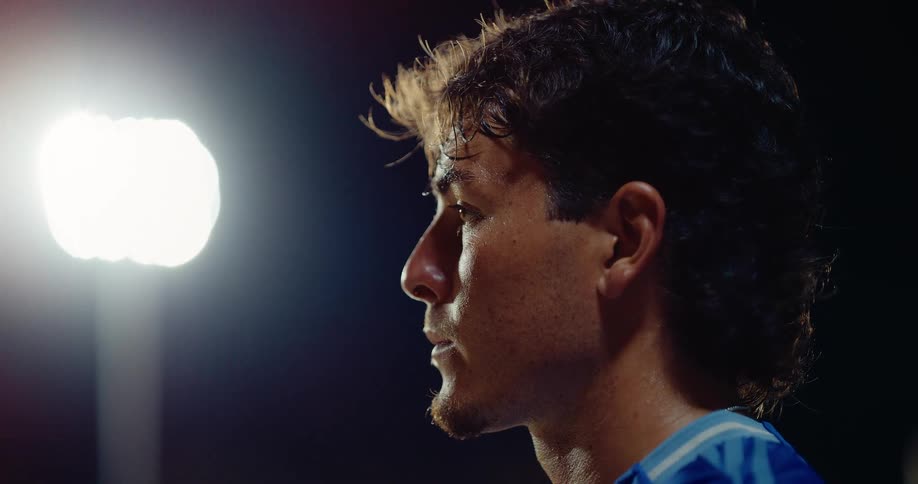 Profile of an young adult man turning his head