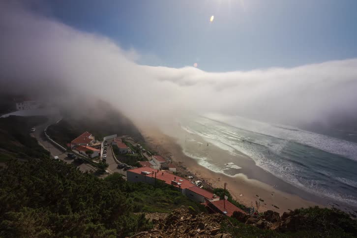 A time lapse of clouds and water on a coast