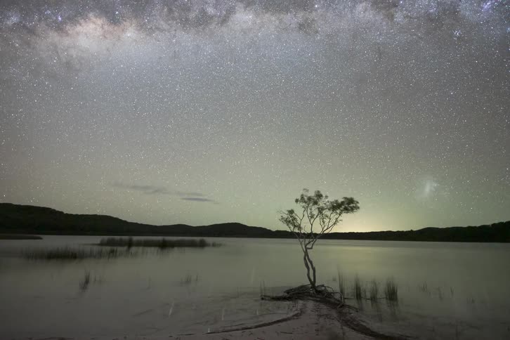 The stars are reflecting on the lake water