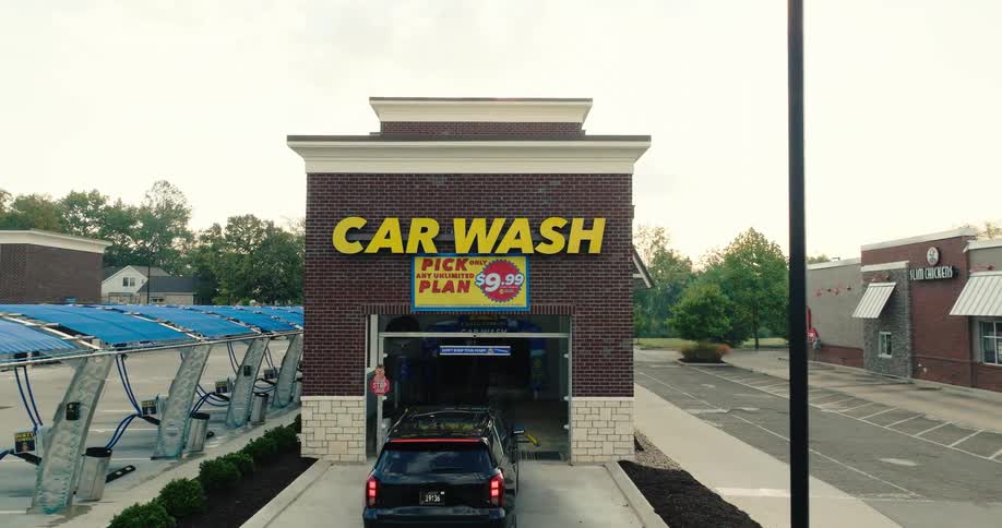 Black van pulls into a neighborhood car wash