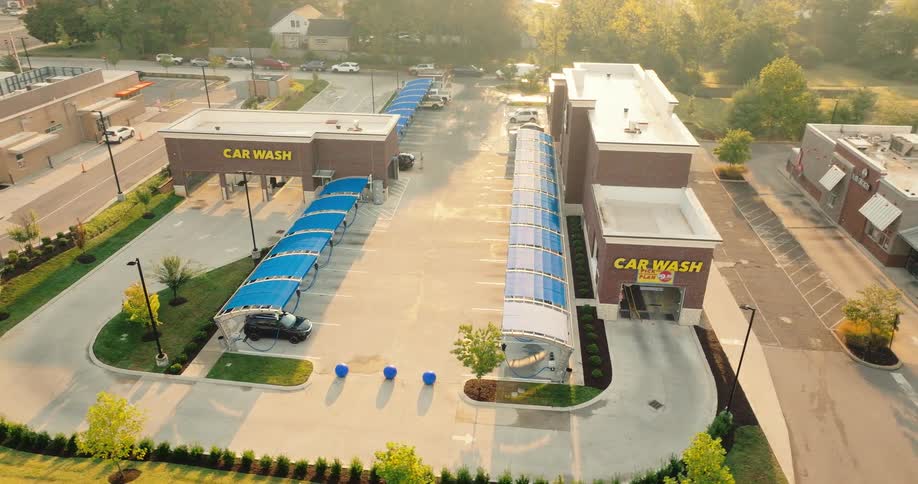 An aerial view of a car wash in a business