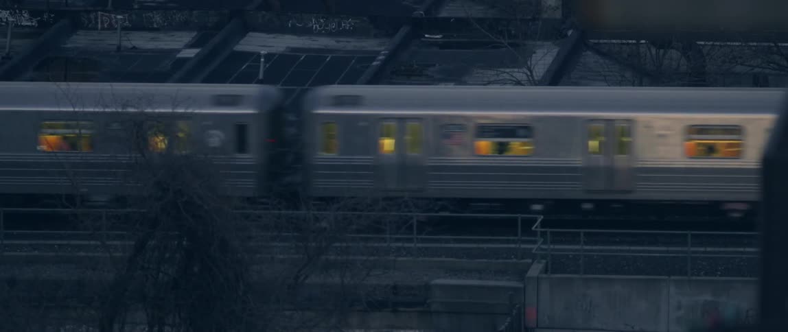 The train travels along metal tracks and carries people