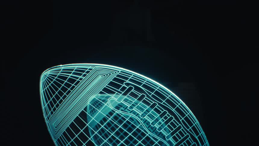 An animated drawing of an american football on a digital screen drawn with blue lines against a black background