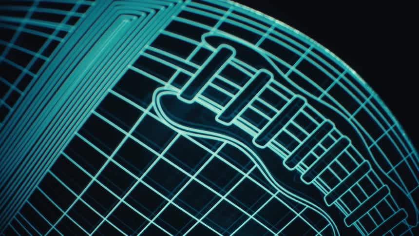 Model of an american football represented by geometric lines on a dark background