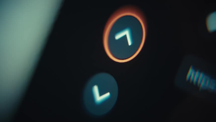A close shot shows a digital interface where a cursor clicks on glowing blue arrow buttons that light up with an orange ring when selected