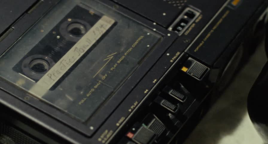 Pressing the stop button on an old cassette player