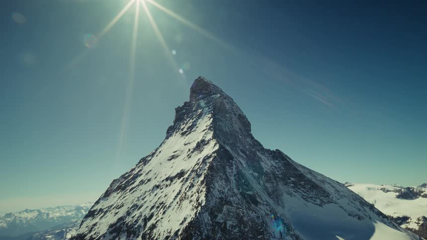 Aerial View of the Matterhorn Covered in Snow on a Sunny Winter Day