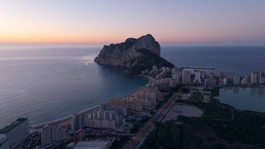 An aerial view of a city along a coast