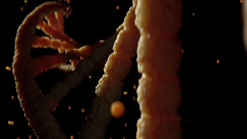 3d animation of a dna double helix rotating in a dark space with floating particles