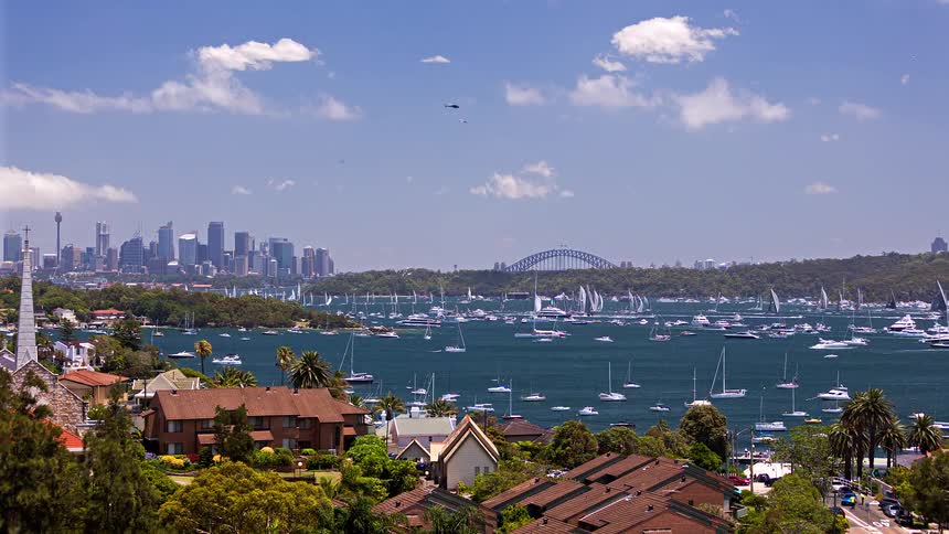 A large group of boats outdoors in water