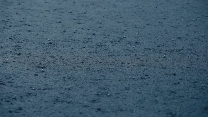 Rain falling on a lake