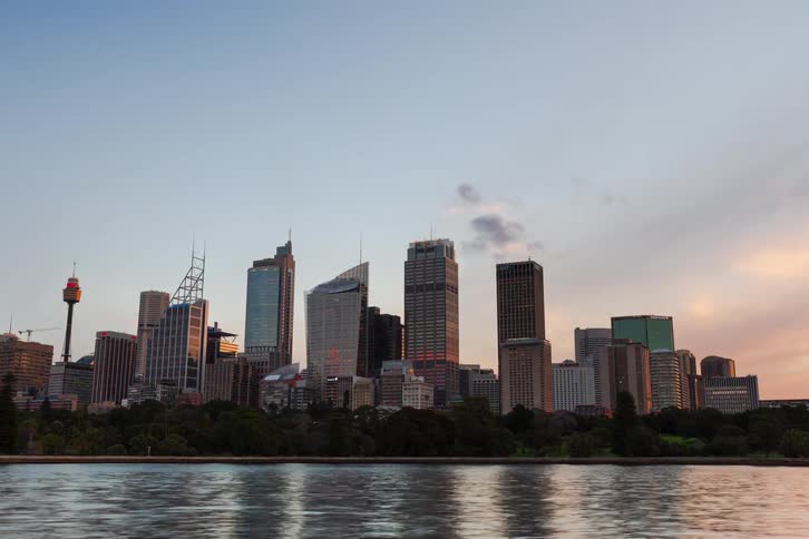 A time lapse of the sun setting over a city