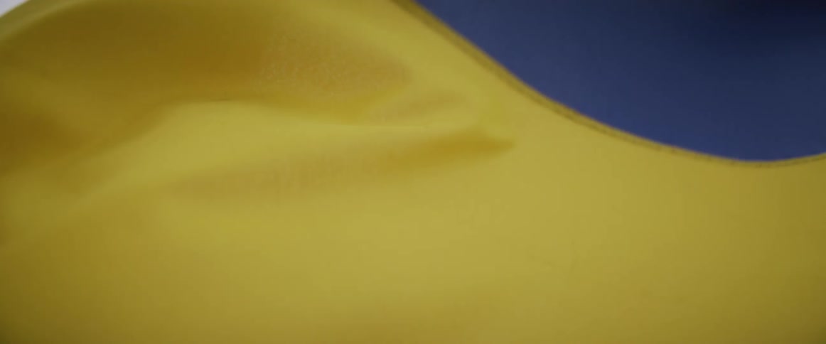 A blue and yellow flag flying