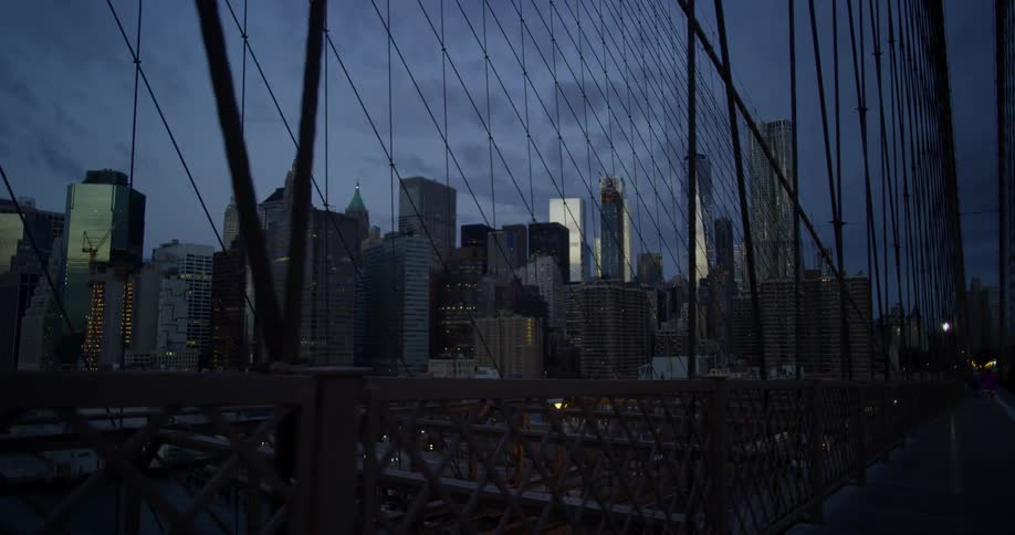 View looking off of a bridge out at a large city