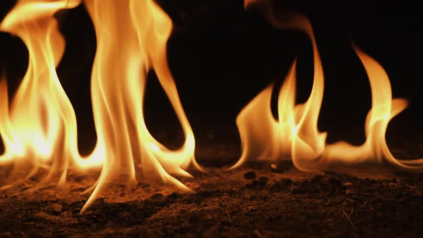 Fire burning brightly on the ground