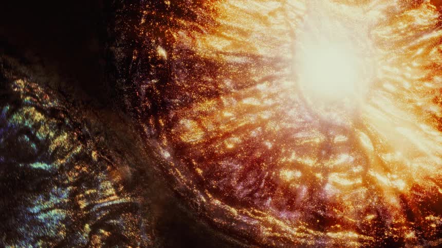 A stunning macro shot of a golden, swirling galaxy with a bright, shining star at its heart