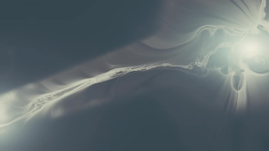Ethereal white streams of light and smoke flow gently across a dark, muted background in an abstract animation
