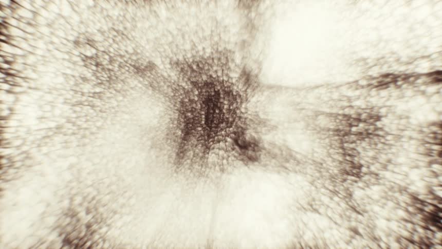 Abstract animation of chaotic particles radiating outwards, with a slow color transition from monochrome to a vintage sepia tone
