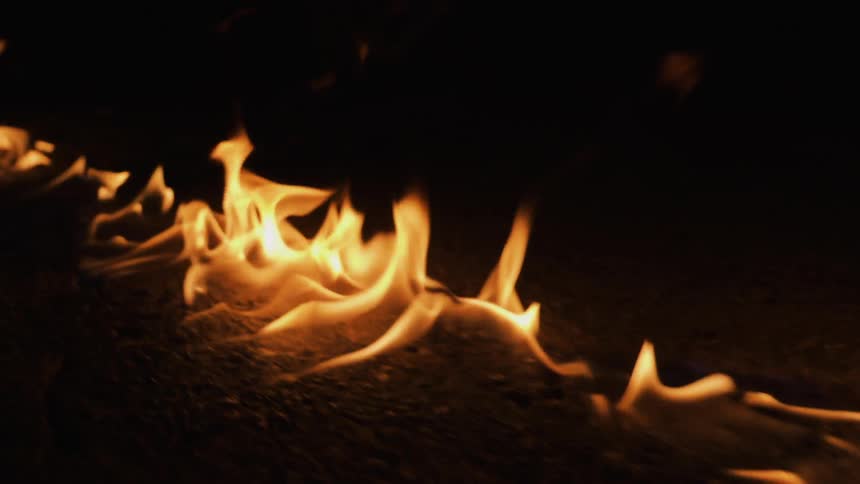 Fire burning brightly on the ground