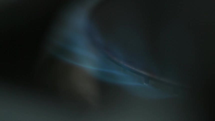 Close up of a burner igniting
