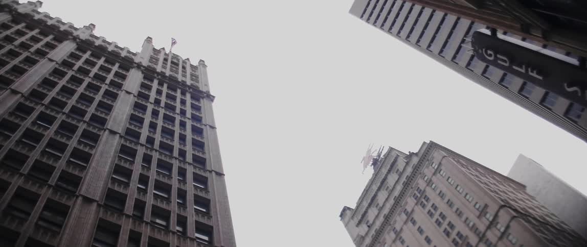 View looking up at skyscrapers in a city