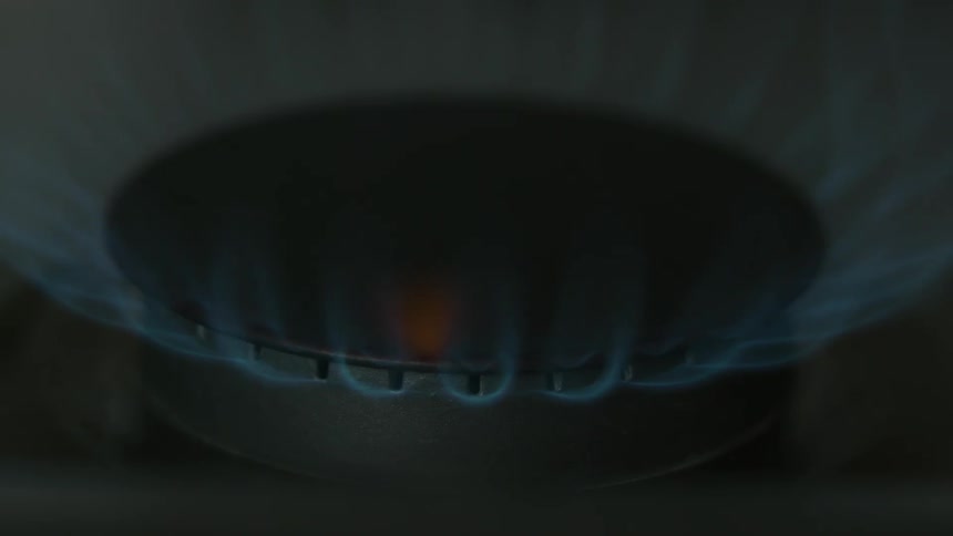 Flames begin from a gas burner
