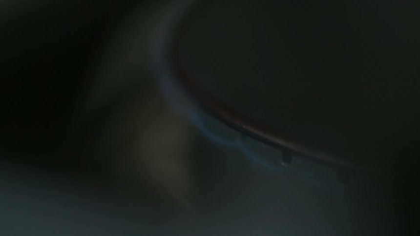 Close up of a burner igniting