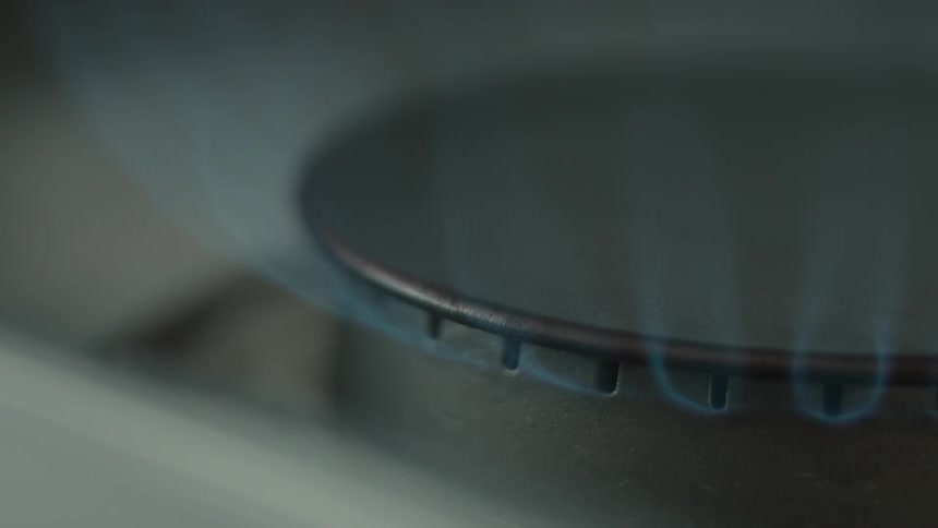 Flame on burner on stove top turning off