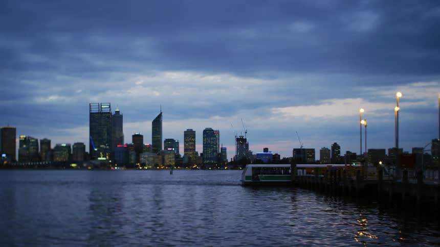 Water ripples with city skyscrapers in the distance