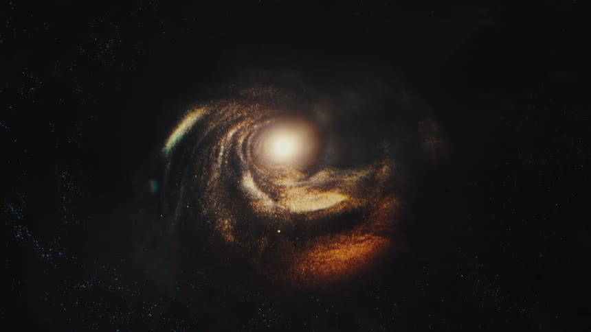 A realistic CGI animation shows a swirling spiral galaxy with a bright, luminous core rotating slowly in the vastness of deep space